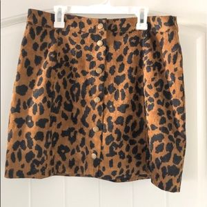 A leopard corduroy button up skirt
